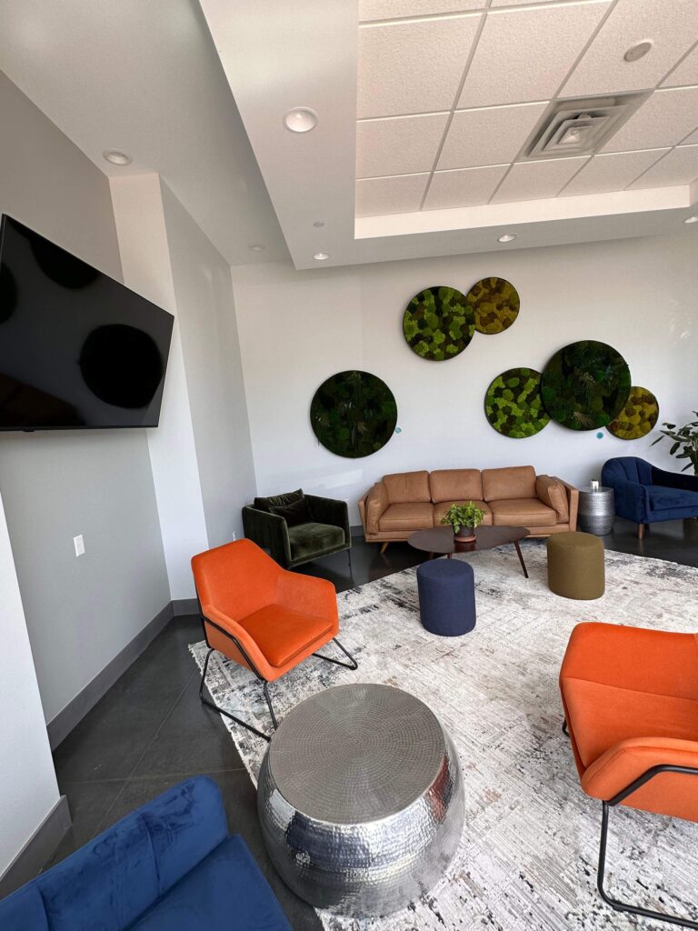 moss dental lobby with tv and moss frames and furnished